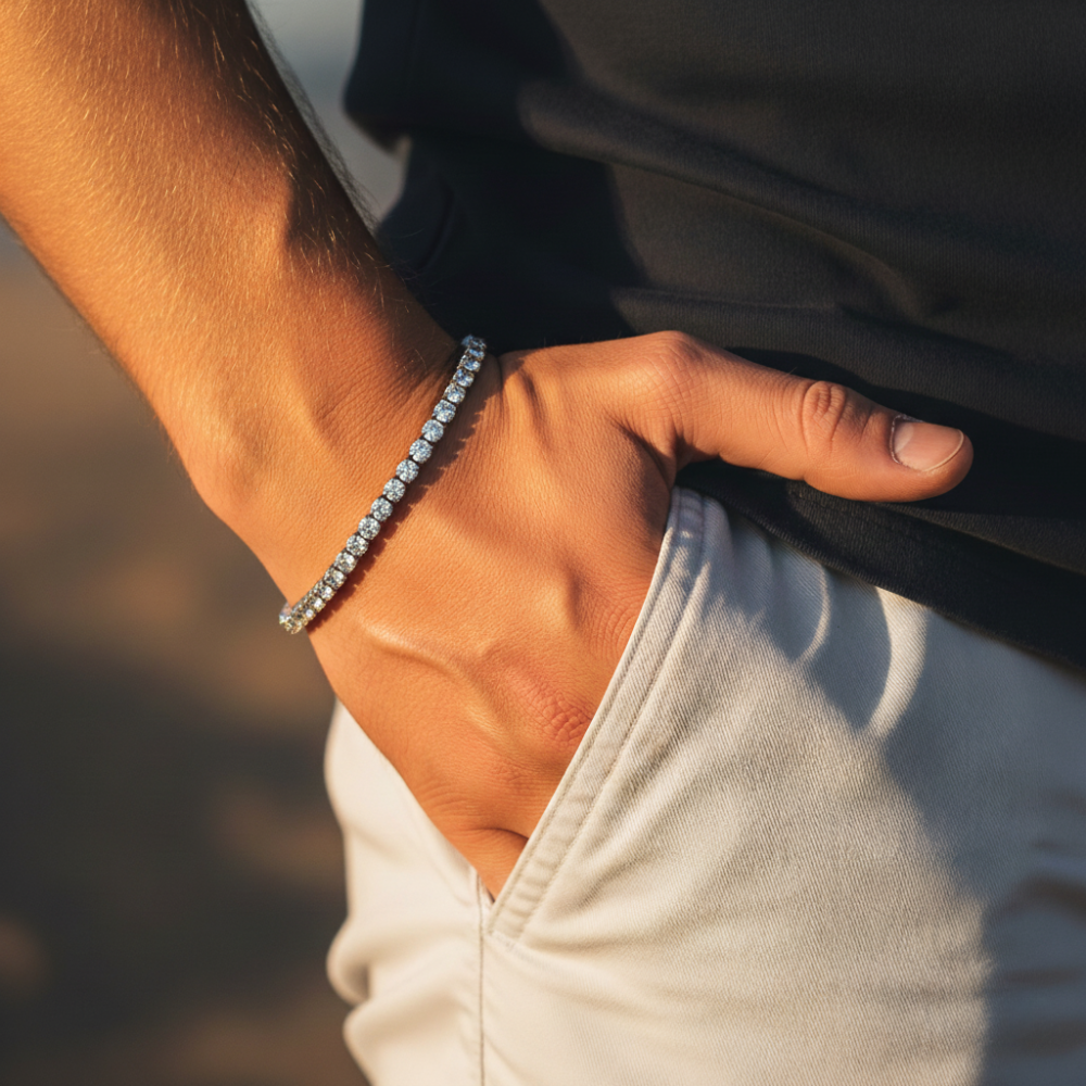 Close-up of a hand wearing the Tennis bracelet with a blurred background