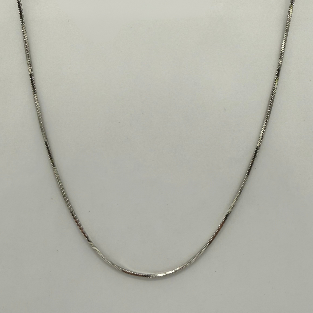 Stainless Steel chain necklace on a light gray background